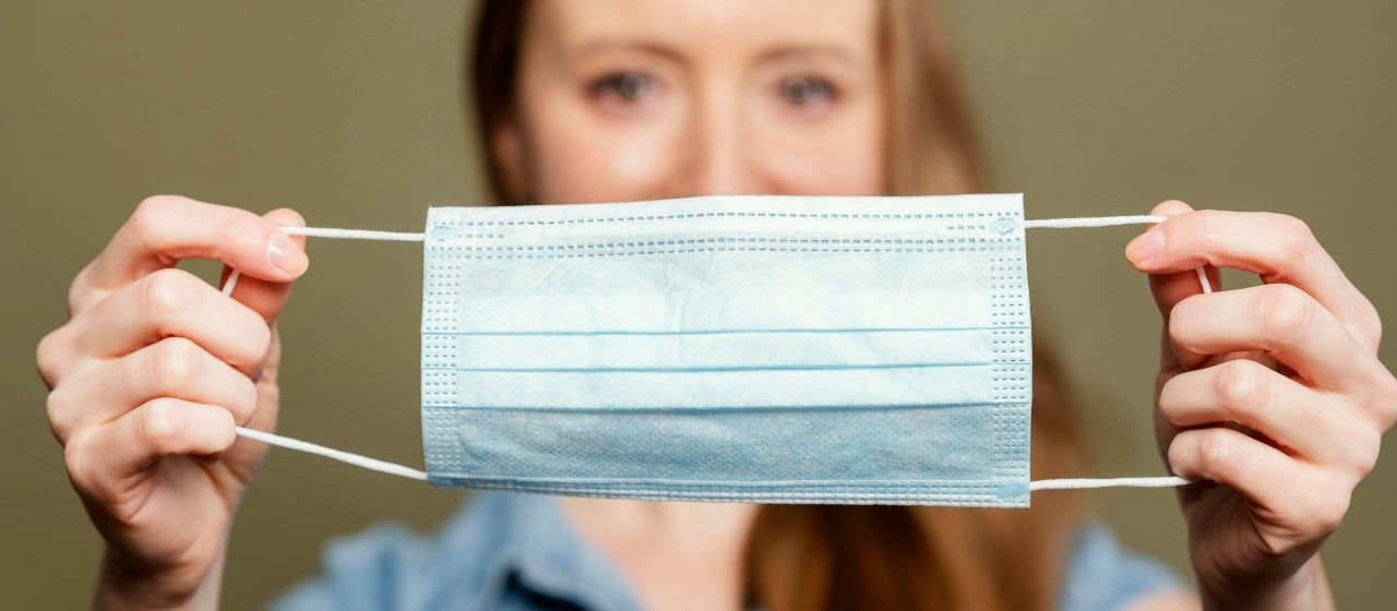 portrait woman with surgical mask