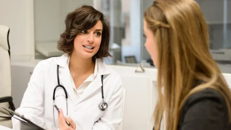 doctor talking with her patient